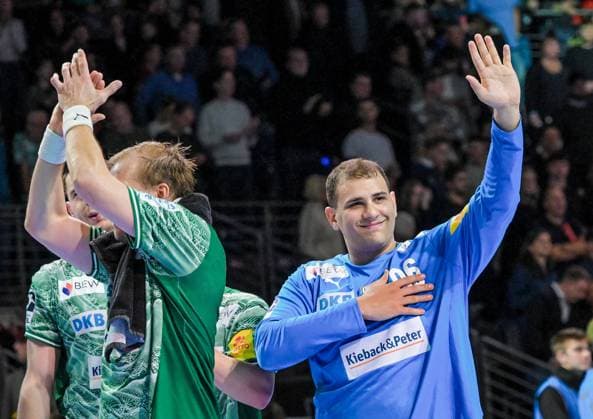 06 11 2025, xlakx, Handball, DHB Pokal 1 8 Final, Fuechse Berlin ThSV Eisenach f l Max Darj Fuechse Berlin , Dejan Milosavljev Fuechse Berlin Cheering about the victory, cheering after the end of the game Berlin Daniel Lakomski