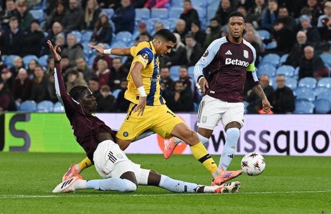 Elad Madmon of Maccabi Tel Aviv is tackled by Amadou Onana of Aston Villa Aston Villa v Maccabi Tel Aviv, UEFA Europa League, Group Stage, Football, Villa Park, Birmingham, UK - 06 Nov 2025Birmingham Villa Park United Kingdom EDITORIAL USE ONLY No use with unauthorised audio, video, data, fixture lists, club league logos or live services. Online in-match use limited to 120 images, no video emulation. No use in betting, games or single club league player publications. Copyright: xAnnaxGowthorpe Shutterstockx 15642257z