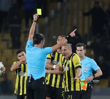 AEK Athens v Shamrock Rovers UEFA Europa Conference League Domagoj Vida of AEK Athens receives a yellow card for complaining to match referee José Luis Munuera at the end of the UEFA Europa Conference League match at OPAP Arena, Athens UK Newspapers OUT Copyright: xYannisxHalasx FIL-22462-0065