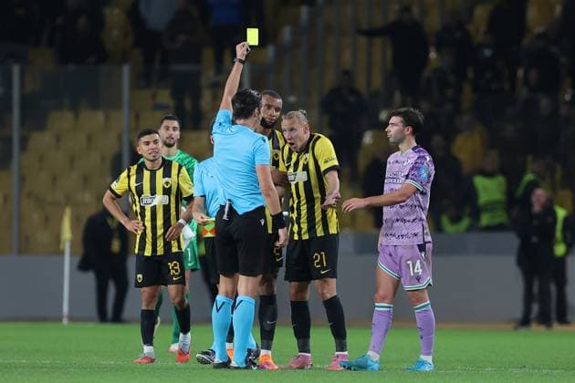 AEK Athens v Shamrock Rovers UEFA Europa Conference League Domagoj Vida of AEK Athens receives a yellow card for complaining to match referee José Luis Munuera at the end of the UEFA Europa Conference League match at OPAP Arena, Athens UK Newspapers OUT Copyright: xYannisxHalasx FIL-22462-0066