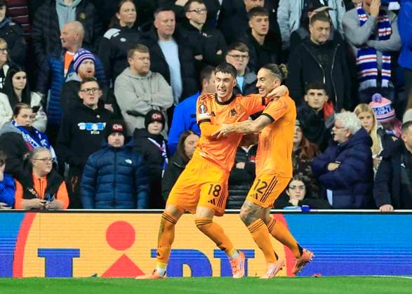 Rangers v A.S. Roma UEFA Europa League Mat as Soul of A.S. Roma (left) celebrates scoring his teams first goal with Kostas Tsimikas of A.S. Roma during the UEFA Europa League match at Ibrox Stadium, Glasgow UK Newspapers OUT Copyright: xFredxPalmerx FIL-22471-0023