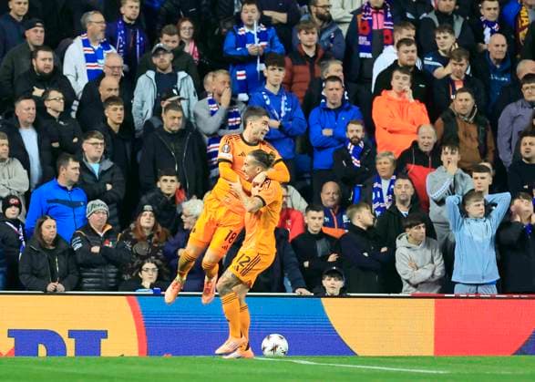 Rangers v A.S. Roma UEFA Europa League Mat as Soul of A.S. Roma (left) celebrates scoring his teams first goal with Kostas Tsimikas of A.S. Roma during the UEFA Europa League match at Ibrox Stadium, Glasgow UK Newspapers OUT Copyright: xFredxPalmerx FIL-22471-0029