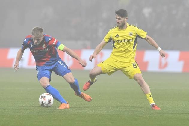 Lukas Cerv of Plzen, left, and Ismail Yuksek of Fenerbahce in action during the Football Europa League 4th round match Viktoria Plzen vs Fenerbahce Istanbul in Pilsen, Czech Republic, November 6, 2025. (CTKxPhoto MiroslavxChaloupka) CTKPhotoP2025110609459  CTKPhotoP2025110609459