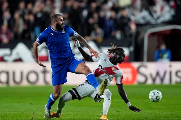 November 6, 2025, Madrid, Madrid, SPAIN: Mikael Ishak of Lech Poznan and Pathe Ciss of Rayo Vallecano in action during the UEFA Conference League 2025 26 League Phase MD3 match between Rayo Vallecano de Madrid and KKS Lech Poznan at Estadio Vallecas on November 06, 2025 in Madrid, Spain. Madrid SPAIN - ZUMAa181 20251106_zaa_a181_055 Copyright: xDennisxAgyemanx