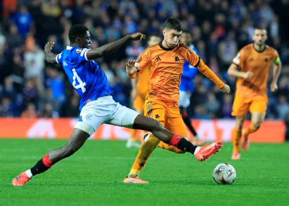 Rangers v A.S. Roma UEFA Europa League Nasser Djiga of Rangers (left) competes for the ball with MatÃ¬as Soule of A.S. Roma during the UEFA Europa League match at Ibrox Stadium, Glasgow UK Newspapers OUT Copyright: xFredxPalmerx FIL-22471-0045