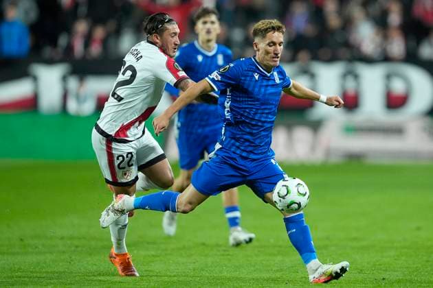Rayo Vallecano s Alfonso Espino (l) and KKS Lech Poznan s Joel Pereira during UEFA Europa Conference League 2025 2026 match 3. November 6,2025. (202511061095)