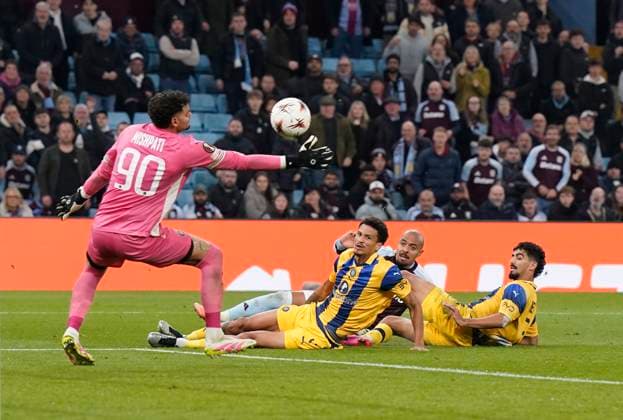 Birmingham, England, 6th November 2025. Roi Mishpati of Maccabi Tel-Aviv saves a shot from Donyell Malen of Aston Villa during the Aston Villa vs Maccabi Tel-Aviv FC UEFA Europa League match at Villa Park, Birmingham. Picture credit should read: Andrew Yates Sportimage EDITORIAL USE ONLY. No use with unauthorised audio, video, data, fixture lists, club league logos or live services. Online in-match use limited to 120 images, no video emulation. No use in betting, games or single club league player publications. SPI_068_AY_Villa_Macabbi SPI-4269-0068