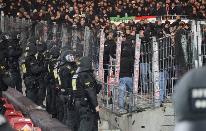 Stuttgart , Football UEFA Europa League VfB Stuttgart vs Feyenoord Rotterdam , Police at Rotterdam fans , Broken fence