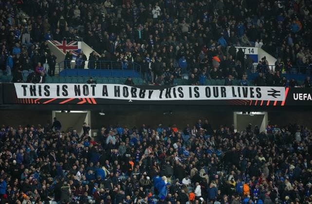 Rangers fans banners in the Sandy Jardine Stand. Rangers v Roma, UEFA Europa League, Group Stage, Football, Ibrox Stadium, Glasgow, Scotland, UK - 06 Nov 2025Glasgow Ibrox Scotland United Kingdom EDITORIAL USE ONLY No use with unauthorised audio, video, data, fixture lists, club league logos or live services. Online in-match use limited to 120 images, no video emulation. No use in betting, games or single club league player publications. Copyright: xStuartxWallace Shutterstockx 15642261bq
