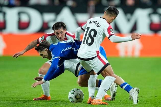 Rayo Vallecano s Alfonso El Pacha Espino (l) and Alvaro Garcia (r) and KKS Lech Poznan s Pablo Rodriguez during UEFA Europa Conference League 2025 2026 match 3. November 6,2025. (202511061369)