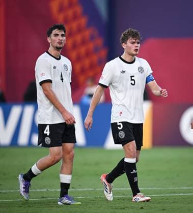 Football, Junior U 17 World Cup 2025 in Doha Qatar Preliminary round 07 11 2025 Group G Germany Korea DPR Ben Hawighorst right, Germany with bloody noseand Elias Vali Fard left, Germany