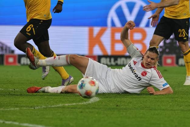 07 11 2025 Soccer Season 2025 2026 2 Soccer Bundesliga 12 Matchday SG Dynamo Dresden SGD 1 FC Nuremberg FCN Club Sportfoto Zink DaMa xdaxmax DFL regulations prohibit any use of photographs as image sequences and or quasi video only for editorial use Artem Stepanov 11, 1 FC Nuremberg FCN looks behind ball while lying down