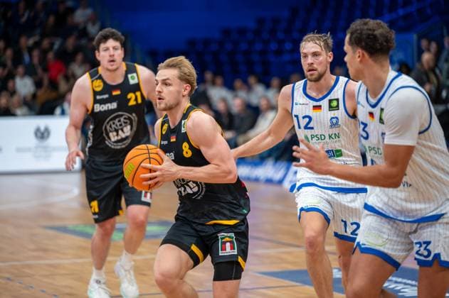 Nicolas Bretzel Bozic Estriche Knights Kirchheim, 21 , Lucas Mayer Bozic Estriche Knights Kirchheim, 08 , Kilian Binapfl PS Karlsruhe Lions, 12 , Maurice Marko Pluskota PS Karlsruhe Lions, 23 , GER, PS Karlsruhe Lions vs Bozic Estriche Knights Kirchheim, BARMER 2 Basketball Bundesliga, 07 Matchday, Season 2025 2026, 07 11 2025 GER, PS Karlsruhe Lions vs Bozic Estriche Knights Kirchheim, BARMER 2 Basketball Bundesliga, 07 Matchday, Season 2025 2026, 07 11 2025 Karlsruhe Copyright: xEibner-Pressefoto SilasxKunzx EP_SKZ