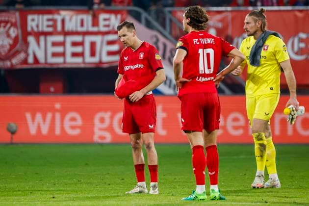 Arno Verschueren of FC Twente and Sam Lammers of FC Twente looks dejected after the final whistle FC Twente v SC Telstar, Eredivisie, FC Twente 65 v Telstar 1963, De Grolsch Veste Stadium, November 7, 2025, Enschede, Netherlands.
