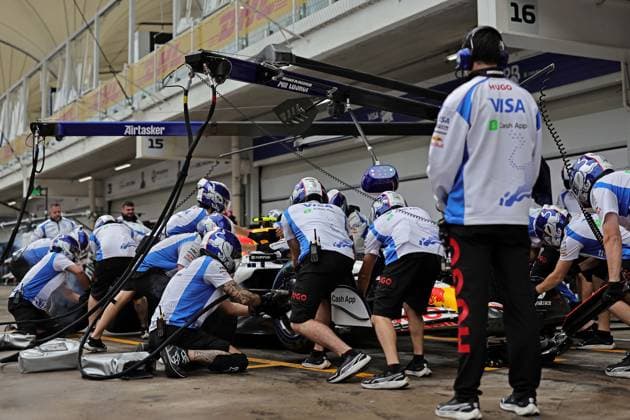6th November 2925; Sao Paulo, Brazil; Mechanics of Liam Lawson (NZL) Visa Cash App RB Formula One Team VCARB 02 Honda practice for pit stops in the Paddock ahead of the F1 Grand Prix of Brazil at Autodromo Jose Carlos Pace during free practice sessions  HeulerxAndrey