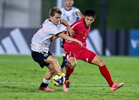 Germany v Korea DPR : Group G - FIFA U-17 World Cup Qatar 2025 Benjamin Ley (L) of Germany and SIl Bok Han of Korea DPR in action during the FIFA U-17 World Cup Qatar 2025 Group G match between Germany and Korea DPR in Doha, Qatar, on November 7, 2025. DOHA Qatar Copyright: xNOUSHADxTHEKKAYILx