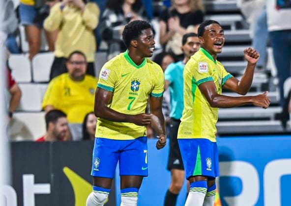(251108) -- DOHA, Nov. 8, 2025 -- Ruan Pablo (L) of Brazil celebrates with his teammate Kayke (R) after scoring during the group H match between Brazil and Indonesia of FIFA U17, U 17 World cup Qatar 2025 in Doha, Qatar, on Nov. 7, 2025. (Photo by Xinhua) (SP)QATAR-DOHA-FIFA U17 WORLD CUP 2025-BRAZIL V INDONESIA Nikku 