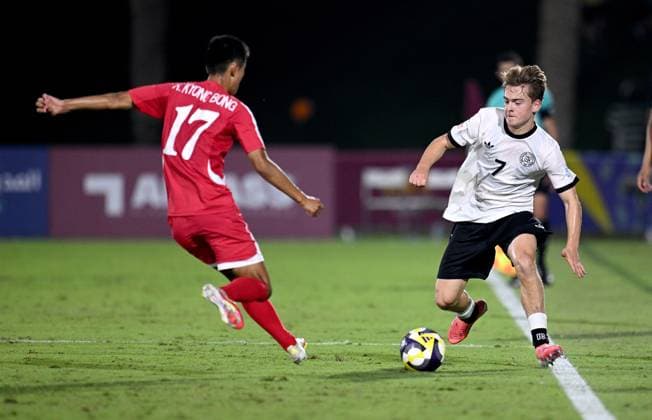 Football, Junior U 17 World Cup 2025 in Doha Qatar Preliminary Round 07 11 2025 Group G Germany Korea DPR Kyong Bong Ri li, Korea DPR v Benjamin Ley re, Germany