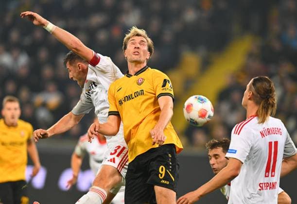 v l Robin Knoche Nuremberg , Vincent Vermeij Dresden , 07 11 2025, Football, GER, Season 2025 2026, 2 Bundesliga, Zweite Liga, 12 Matchday, Rudolf Harbig Stadion Dresden, SG Dynamo Dresden 1 FC Nürnberg, DFB AND DFL REGULATIONS PROHIBIT ANY USE OF PHOTOGRAPHS as IMAGE SEQUENCES and or QUASI VIDEO,