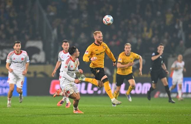 front v l Berkay Yilmaz Nuremberg vs Nils Fröling Dresden , 07 11 2025, Football, GER, Season 2025 2026, 2 Bundesliga, Zweite Liga, 12 Matchday, Rudolf Harbig Stadion Dresden, SG Dynamo Dresden 1 FC Nürnberg, DFB AND DFL REGULATIONS PROHIBIT ANY USE OF PHOTOGRAPHS as IMAGE SEQUENCES and or QUASI VIDEO,