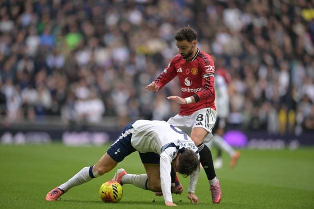 Spurs vs Man Utd, Premier League Joao Palhinha of Tottenham Hotspur clashes with Bruno Fernandes of Manchester United, ManU during the Spurs vs Man Utd, Premier League match at the Tottenham Hotspur Stadium London. London Tottenham Hotspur Stadium UK Copyright: xMartinxDaltonx Spurs_vs_ManUtd_081125_MD_120