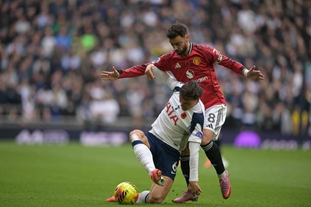 Spurs vs Man Utd, Premier League Joao Palhinha of Tottenham Hotspur clashes with Bruno Fernandes of Manchester United, ManU during the Spurs vs Man Utd, Premier League match at the Tottenham Hotspur Stadium London. London Tottenham Hotspur Stadium UK Copyright: xMartinxDaltonx Spurs_vs_ManUtd_081125_MD_129
