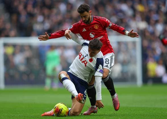 8th November 2025; Tottenham Hotspur Stadium, London, England; Premier League Football, Tottenham Hotspur versus Manchester United, ManU Bruno Fernandes of Manchester United challenged by Joao Palhinha of Tottenham Hotspur  JohnxPatrickxFletcher