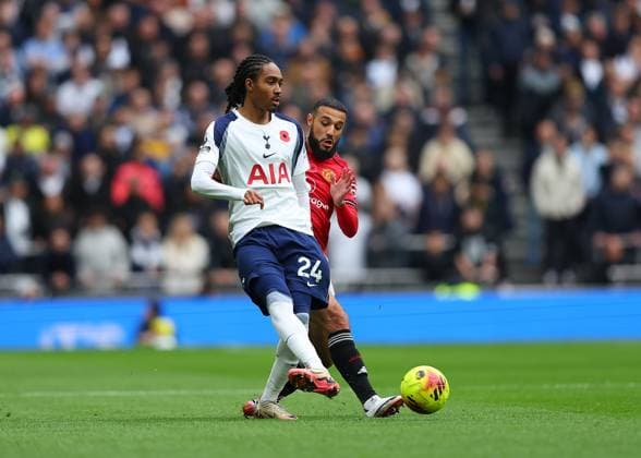 8th November 2025; Tottenham Hotspur Stadium, London, England; Premier League Football, Tottenham Hotspur versus Manchester United, ManU Djed Spence of Tottenham Hotspur challenged by Noussair Mazraoui of Manchester United  JohnxPatrickxFletcher