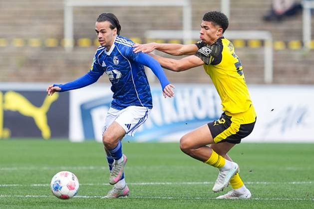 08 11 2025, xydrx, Football, Regionalliga West, Borussia Dortmund II FC Schalke 04 II, Season 2025 2026, Stadion Rote Erde Max Lamby FC Schalke 04 II 3 in duel against Jordi Paulina Borussia Dortmund II 23 North Rhine-Westphalia Germany
