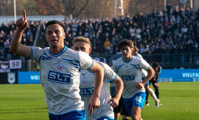 8 11 2025, Soccer, GER, Men, 3 League, DFL, Matchday 14, Season 2025 26, SSV Ulm 1946 FC Hansa Rostock Kenan Fatkic FC Hansa Rostock, li celebrates the goal for 1 0 Ulm Donaustadion Baden Würrttemberg Germany