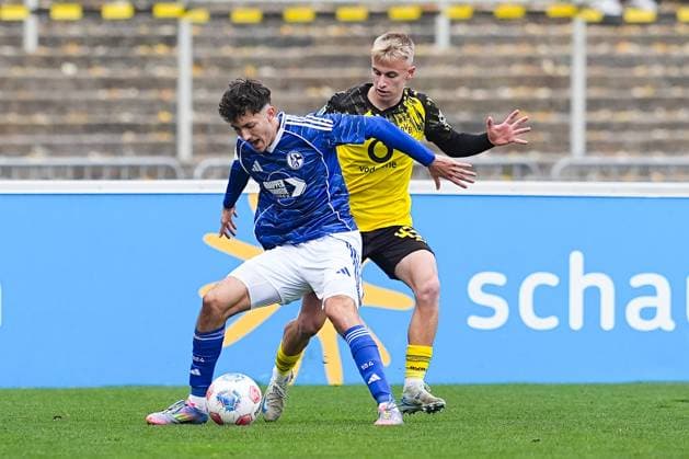 08 11 2025, xydrx, Football, Regionalliga West, Borussia Dortmund II FC Schalke 04 II, Season 2025 2026, Stadion Rote Erde Max Hauswirth FC Schalke 04 II 27 in duel against Danylo Krevsun Borussia Dortmund II 43 North Rhine-Westphalia Germany