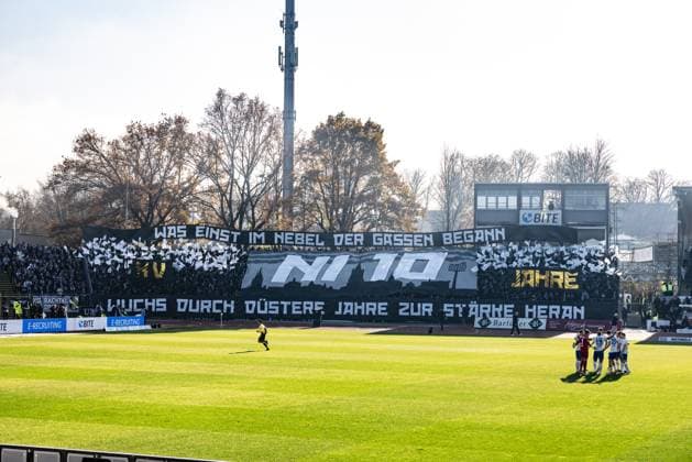 Football, Season 2025 2026, 3 Liga, Donaustadion Ulm, 14 Matchday, SSV Ulm 1846 Football FC Hansa Rostock, 08 11 2025 08 11 2025, Football, Season 2025 2026, 3 Liga, Donaustadion Ulm, 14 Matchday, SSV Ulm 1846 Football FC Hansa Rostock, The fans of SSV Ulm in the D Block Donaustadion with a choreo for 15 years fan group Nebulosa Impero Photo Lucca Fundel Ulm Donaustadion Baden Württemberg Germany