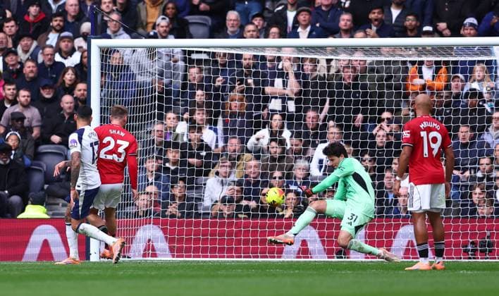 London, England, 8th November 2025. Cristian Romero of Tottenham Hotspur has his shot saved by Senne Lammens of Manchester United, ManU during the Tottenham Hotspur vs Manchester United Premier League match at the Tottenham Hotspur Stadium, London. Picture credit should read: Paul Terry Sportimage EDITORIAL USE ONLY. No use with unauthorised audio, video, data, fixture lists, club league logos or live services. Online in-match use limited to 120 images, no video emulation. No use in betting, games or single club league player publications. SPI_037_PT_Tottenaham_Man_Utd SPI-4271-0037
