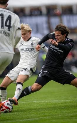Soccer, Season 2025 2026, Regionalliga West, 08 11 2025, Matchday 15, Men, 1 FC Bocholt black vs Borussia Moenchengladbach U23 white v l Fritz Henri Fleck Borussia Moenchengladbach U23 , Nicolas Hirschberger 1 FC Bocholt , Bocholt Stadion am Huenting Nordrhein Westfalen Germany 251108_fb_1fc-bocholt_borussia-moenchengladbach-u23_45909
