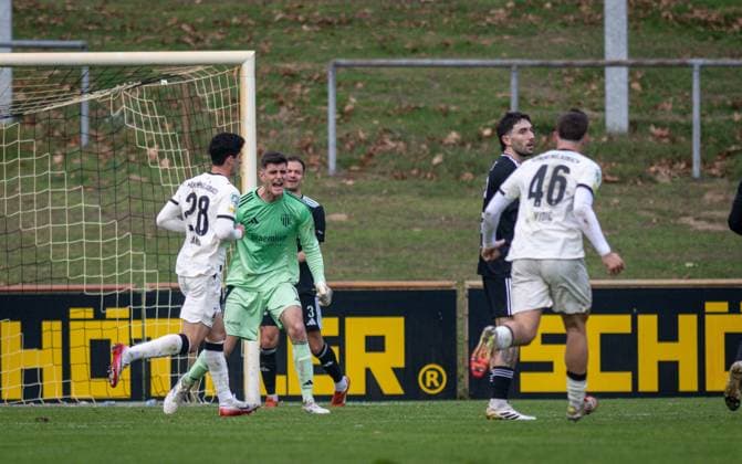 Soccer, Season 2025 2026, Regionalliga West, 08 11 2025, Matchday 15, Men, 1 FC Bocholt black vs Borussia Moenchengladbach U23 white v l Grant Leon Ranos Borussia Moenchengladbach U23 , Lucas Fox Goalkeeper 1 FC Bocholt , Julian Riedel 1 FC Bocholt , Marlon Frey 1 FC Bocholt , Nico Vidic Borussia Moenchengladbach U23 , Bocholt Stadion am Huenting Nordrhein Westfalen Germany 251108_fb_1fc-bocholt_borussia-moenchengladbach-u23_45929