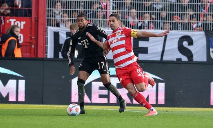 Michael Olise, Rani Khedira duel match scene Action Sport Football Soccer Bundesliga Men DFL 10 Matchday Season 2025 2026 08 11 2025 1 FC Union Berlin FCU vs FC Bayern Munich FCB DFL regulations prohibit any use of photographs as image sequences and or quasi video