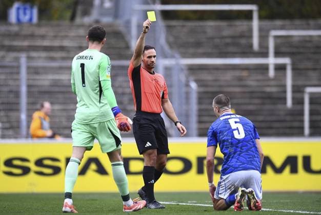 Borussia Dortmund U23 Schalke 04 U23 FOR EDITORIAL PURPOSES ONLY EDITORIAL USE ONLY p Football Regionalliga West 15 Matchday Borussia Dortmund U23 Schalke 04 U23 on 08 11 2025 at Stadion Rote Erde in Dortmund Referee Leonidas Exuzidis shows Magnus Rösner Schalke 04 U23 , right yellow card Luca Podlech Schalke 04 U23 , left Germany North Rhine-Westphalia Dortmund Copyright ThorstenxTillmann Copyright: ThorstenxTillmann doc836acjryeew4tpv8f5 ,EDITORIAL USE ONLY Copyright: ThorstenxTillmann