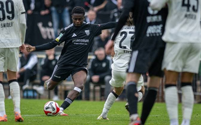 Soccer, Season 2025 2026, Regionalliga West, 08 11 2025, Matchday 15, Men, 1 FC Bocholt black vs Borussia Moenchengladbach U23 white v l Aaron Bayakala 1 FC Bocholt , Julian Korb Borussia Moenchengladbach U23 , Bocholt Stadion am Huenting Nordrhein Westfalen Germany 251108_fb_1fc-bocholt_borussia-moenchengladbach-u23_45975