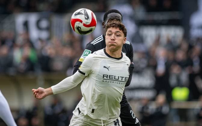 Soccer, Season 2025 2026, Regionalliga West, 08 11 2025, Matchday 15, Men, 1 FC Bocholt black vs Borussia Moenchengladbach U23 white v l Kemal Cirpan Borussia Moenchengladbach U23 , Jeff Amoah Mensah 1 FC Bocholt , Bocholt Stadion am Huenting Nordrhein Westfalen Germany 251108_fb_1fc-bocholt_borussia-moenchengladbach-u23_45978