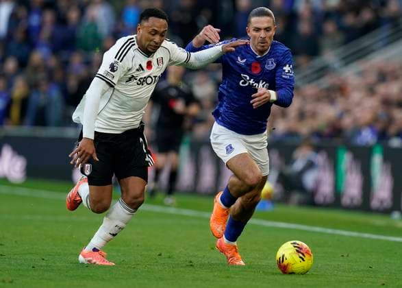 Liverpool, England, 8th November 2025. Jack Grealish of Everton (R) is challenged by Kenny Tete of Fulham during the Everton vs Fulham Premier League match at Hill Dickinson Stadium, Liverpool. Picture credit should read: Andrew Yates Sportimage EDITORIAL USE ONLY. No use with unauthorised audio, video, data, fixture lists, club league logos or live services. Online in-match use limited to 120 images, no video emulation. No use in betting, games or single club league player publications. SPI_006_AY_EVERTON_FULHAM SPI-4273-0006