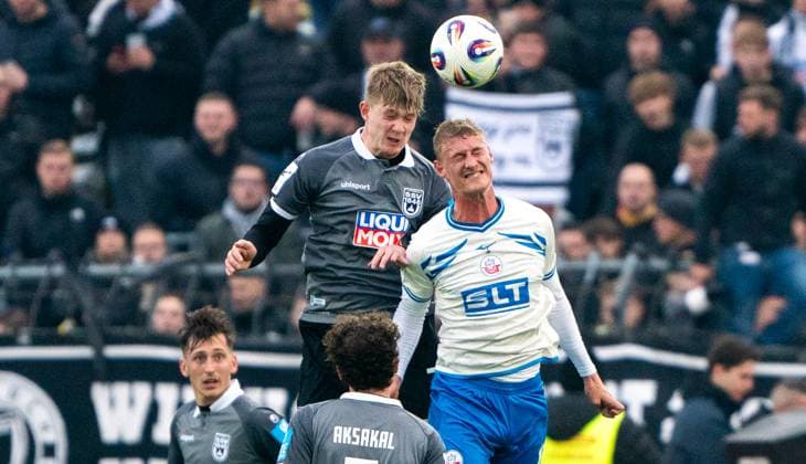 8 11 2025, Soccer, GER, Men, 3 League, DFL, Matchday 14, Season 2025 26, SSV Ulm 1846 FC Hansa Rostock Emil Holten FC Hansa Rostock, right vs Jan Boller SSV Ulm 1846, left Ulm Donaustadion Baden Würrttemberg Germany