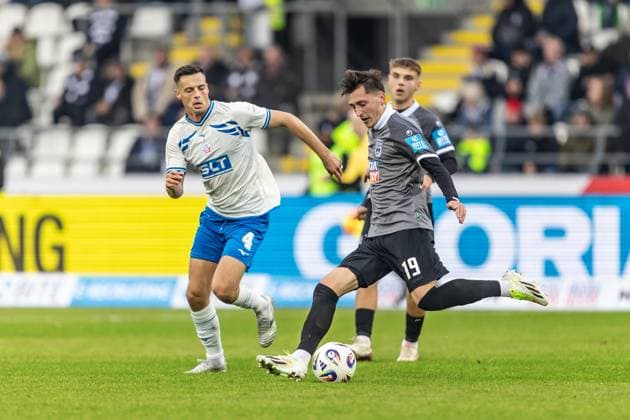 Football, Season 2025 2026, 3 Liga, Donaustadion Ulm, Matchday 14, SSV Ulm 1846 Football FC Hansa Rostock, 08 11 2025 08 11 2025, Football, Season 2025 2026, 3 Liga, Donaustadion Ulm, Matchday 14, SSV Ulm 1846 Football FC Hansa Rostock, v l 4 Kenan Fatkic FC Hansa Rostock , 19 Jonathan Meier SSV Ulm 1846 Football Photo Lucca Fundel Ulm Donaustadion Baden Württemberg Germany