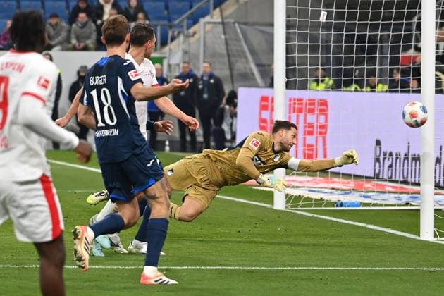 Oliver BAUMANN,Goalkeeper 1899 Hoffenheim parries the ball,Parade Action Soccer 1 Bundesliga Season 2025 2026, 10 Matchday, Matchday10 TSG 1899 Hoffenheim RB Leipzig 3 1 on 08 11 2025 PreZero ARENA