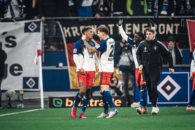 Soccer Men Season 2025 2026 1 Soccer Bundesliga 10 Matchday Hamburger SV vs Borussia Dortmund 08 11 2025 v l Goalscorer Ransford Yeboah Königsdörffer 11, HSV and Nicolai Remberg 21, HSV cheer Hamburg Volksparkstadion Hamburg Germany