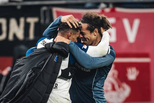 Soccer Men Season 2025 2026 1 Soccer Bundesliga 10 Matchday Hamburger SV vs Borussia Dortmund 08 11 2025 v l Goalscorer Ransford Yeboah Königsdörffer 11, HSV and Yussuf Poulsen 15, HSV cheer Hamburg Volksparkstadion Hamburg Germany