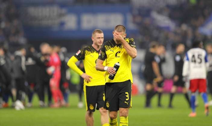 Photo Disappointment after the final whistle among the players from Dortmund , here Waldemar ANTON BVB and Julian Ryerson mourn at the back Soccer 1 Liga , 10 Matchday on Sat 08 11 2025 Hamburger SV Borussia Dortmund