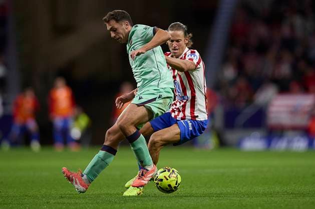 Ander Olasagasti (UD Levante) and Marcos Llorente (Atletico de Madrid) battle for the ball during the LaLiga EA Sports match between AtlÃ tico Madrid v Levante UD at Estadio Riyadh Air Metropolitano on November 8, 2025 in Madrid, Spain. (Photo by Manu Reino DeFodi Images) Ander Olasagasti UD Levante and Marcos Llorente Atletico de Madrid battle for the ball during the LaLiga EA Sports match between AtlÃ tico Madrid v Levante UD at Estadio Riyadh Air Metropolitano on November 8, 2025 in Madrid, Spain Photo by Manu Reino DeFodi Images