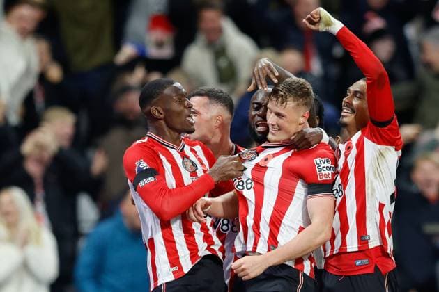 8th November 2025; Stadium of Light, Sunderland, England; Premier League Football, Sunderland versus Arsenal; Daniel Ballard of Sunderland celebrates with team mates after he scored his sides first goal of the match in the 37th minute for 1-0  CraigxCowan