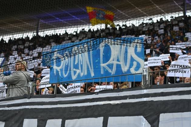 Hoffenheim fans, football fans, hang wanted posters of player consultant Roger WITTMANN on wanted posters, wanted poster, protest, grandchild fraudster Football 1 Bundesliga season 2025 2026, 10 matchday, matchday10 TSG 1899 Hoffenheim RB Leipzig 3 1 on 08 11 2025 PreZero ARENA