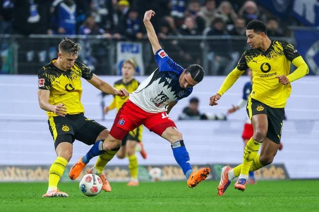 1 Bundesliga Hamburger SV Borussia Dortmund on 08 11 2025 at Volksparkstadion in Hamburg Rayan Philippe Hamburg 14 vs Nico Schlotterbeck Dortmund 4 and Jobe Bellingham Dortmund 7 MH